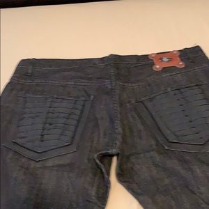 Jeans alligator pockets and trim